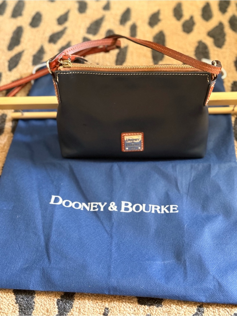 Dooney & Bourke Leather Navy Crossbody with Tan Trim and Gold Plaque